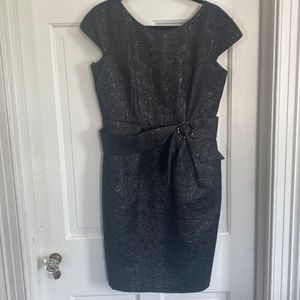 Cap sleeve cocktail dress with rhinestone embellishment at the waist